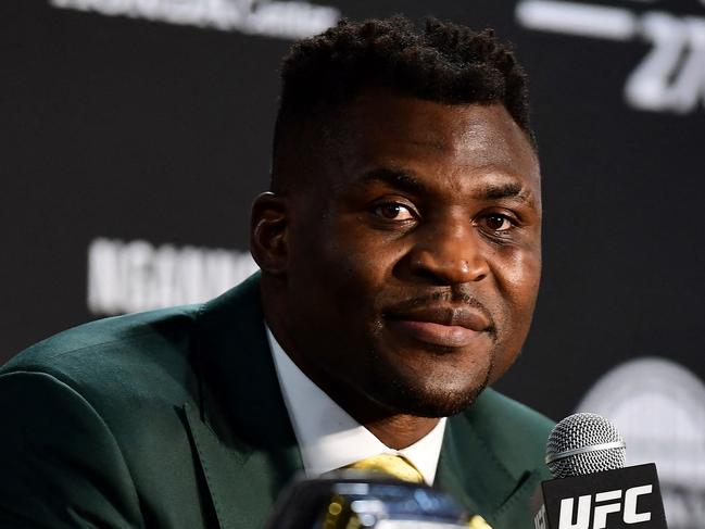 Champion Francis Ngannou takes questions in the press room after defeating French Cyril Gane in their UFC 270 championship fight in Anaheim on January 22, 2022. (Photo by Frederic J. BROWN / AFP)