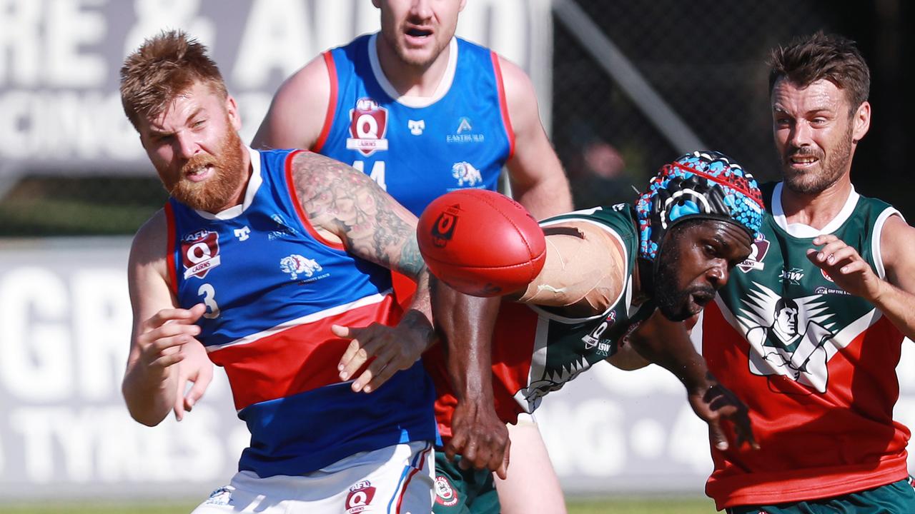 Bulldogs' Josh Brinn and Cutters' Dwayne Bosen in the AFL Cairns Premiership Men's match between the South Cairns Cutters and Centrals Trinity Beach Bulldogs, held at Fretwell Park. Picture: Brendan Radke