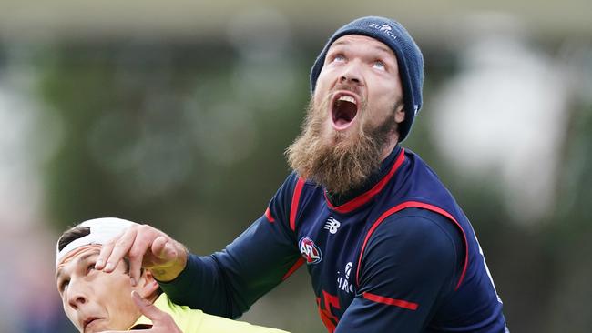 Max Gawn of the Demons competes for the ball over Sam Weideman of the Demons during an AFL Melbourne Football Club training session at Casey Fields in Melbourne, Wednesday, June 3, 2020. (AAP Image/Michael Dodge) NO ARCHIVING