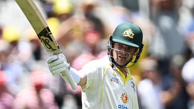 Harris raises his bat after scoring a half century in the Third Test in Melbourne. Picture: Getty Images