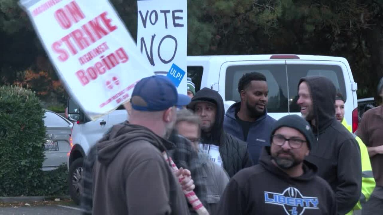 Boeing workers vote to reject wage deal and continue strike