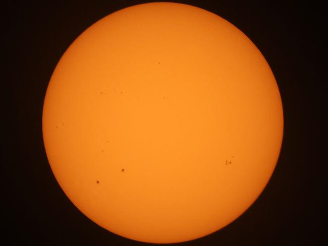 The International Space Station transits the sun as seen from Kuwait City. Picture: Yasser Al-Zayyat/AFP