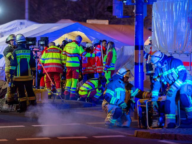 Police vans and ambulances in the city centre after car drove into the crowded Christmas market. Picture: Craig Stennett/Getty Images