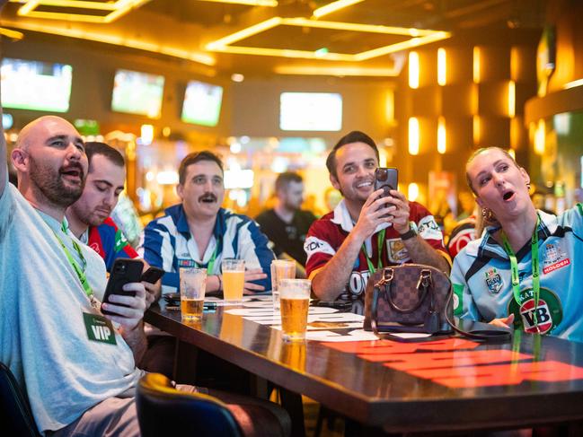 NRL fans cheer on at the SuperCoach Viva Non-Vegas Party at the Star Casino in Sydney to mark the NRL season kicking off with two historic games in Las Vegas. Photo: Tom Parrish