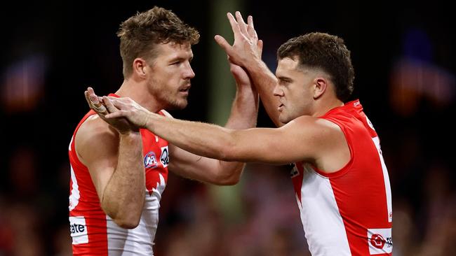 SYDNEY, AUSTRALIA - SEPTEMBER 20: Luke Parker (left) and Tom Papley of the Swans celebrate during the 2024 AFL First Preliminary Final match between the Sydney Swans and the Port Adelaide Power at The Sydney Cricket Ground on September 20, 2024 in Sydney, Australia. (Photo by Michael Willson/AFL Photos via Getty Images)