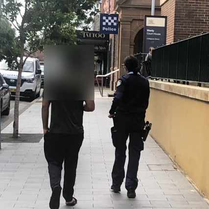 A rideshare service driver was questioned by Manly police after the car he was driving collided with a delivery scooter on West Esplanade. Picture: Jim O’Rourke