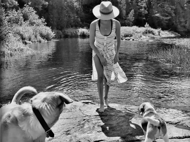 Markle enjoys a day by the water with her dogs, Bogart and Guy. Picture: Netflix