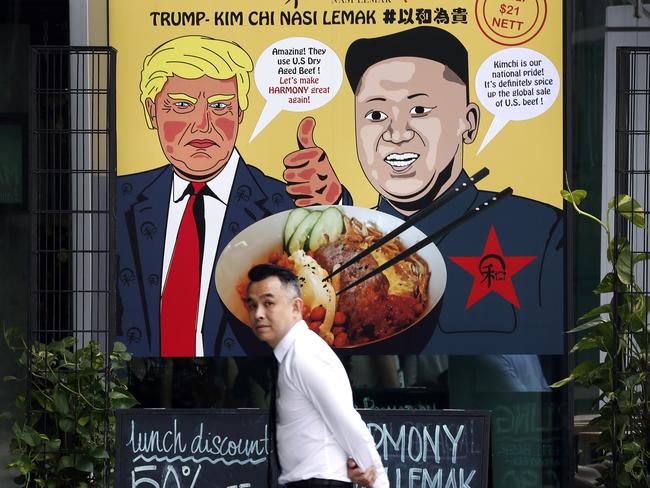 Cartoon caricatures of Donald Trump and Kim Jong-un which are supposed to be the inspiration behind a local dish, the "Trump-Kim Chi Nasi Lemak" in Singapore. Picture: AP/Wong Maye-E