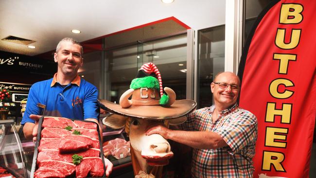 Richard Cavill, Russell Jones and CJ the cow. Photo: Scott Powick Newscorp