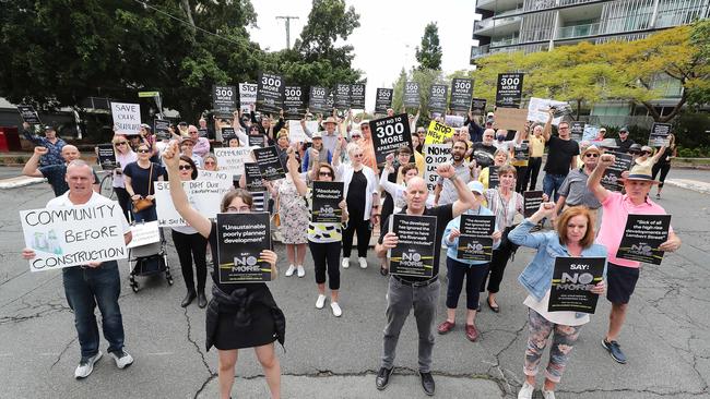 Locals block Lambert Street at a protest against the Pikos three-tower project. Picture: Peter Wallis