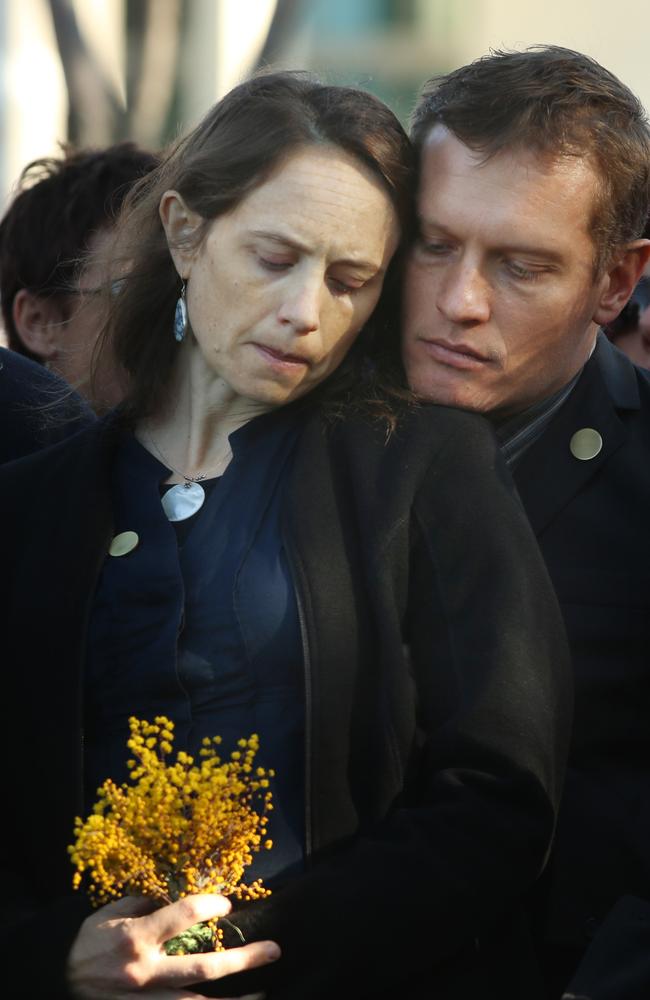 Paul Guard with his wife Jessie Wells at a national memorial service in Canberra for the first anniversary of the downing of Flight MH1. Picture: Gary Ramage