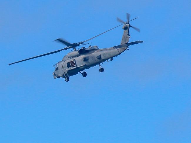 Eleven Australian navy helicopters sold to an Aussie company are now at the centre of a $173m international spat. (File photo from Australian Defence/AFP)