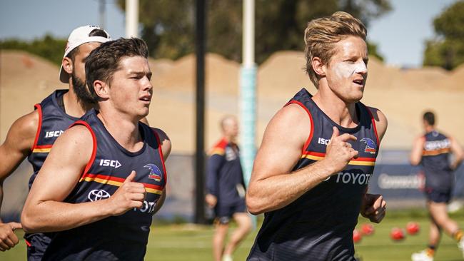 Ned McHenry and Rory Sloane. Picture: AAP/Mike Burton