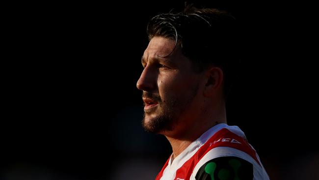 Gareth Widdop of the Dragons looks on.