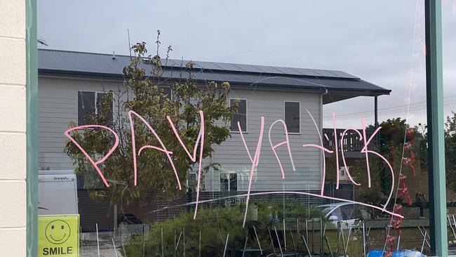 “Pay ya tick” was allegedly spray painted on the restaurant windows. Picture: Katrina Muhsin/10 NEWS FIRST