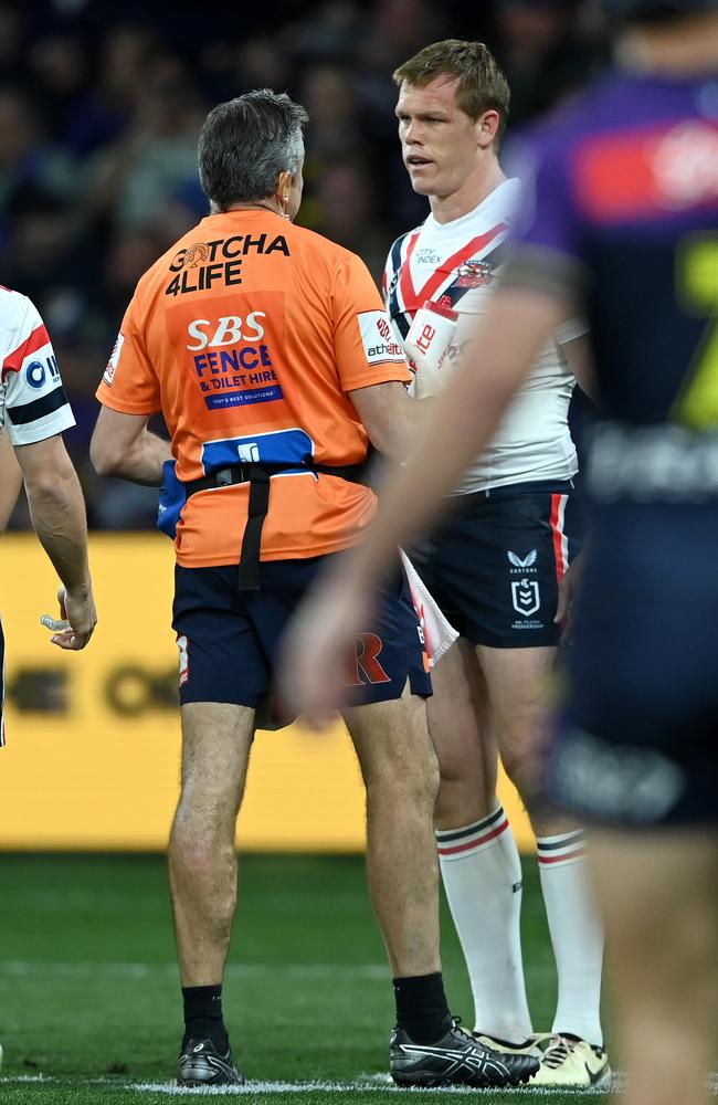 Lindsay Collins is assessed after being hit by Nelson Asofa-Solomona. Picture: NRL