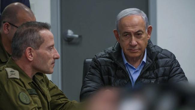 Israeli Prime Minister Benjamin Netanyahu attending a meeting in the command centre of the defence ministry in Tel Aviv on Saturday. Picture: AFP