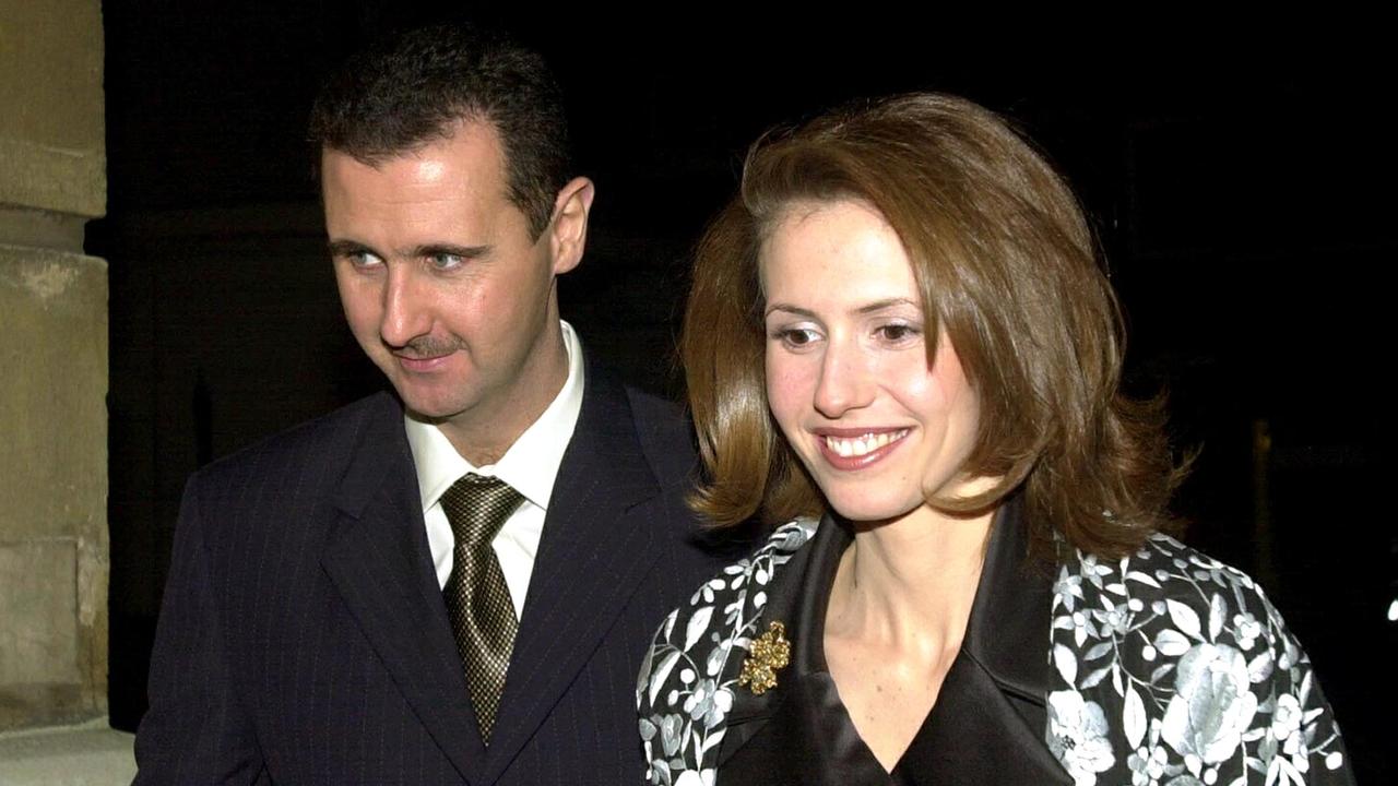 Syrian ousted president Bashar al-Assad and his wife Asma. Picture: NICOLAS ASFOURI/AFP