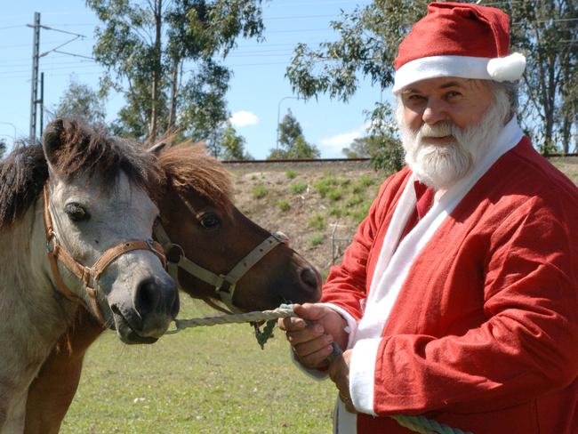 Santa and his two little ponies asked to tiptoe off racetrack as quickly as possible.