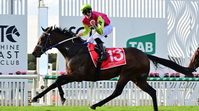 Knight's Choice wins the Group 3 Winx Guineas on the Sunshine Coast for trainers Sheila Laxon and John Symons and apprentice jockey Jaden Lloyd. Picture: Grant Peters, Trackside Photography