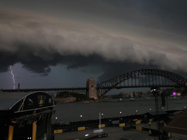 Heavy rain and lightning across Sydney Harbour. Picture: Toby Zerna