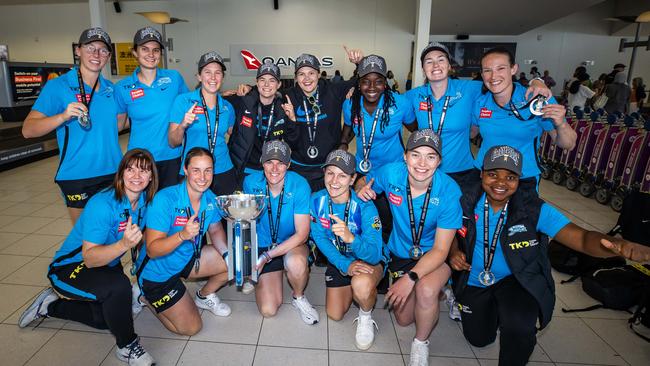 Adelaide Strikers WBBL team arrive back in Adelaide with the championship trophy in hand. Picture: Tom Huntley