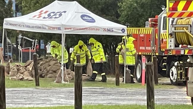 Rural Fire Service crew collecting sandbags near Coffs Skatepark on Tuesday afternoon. Picture: Chris Knight