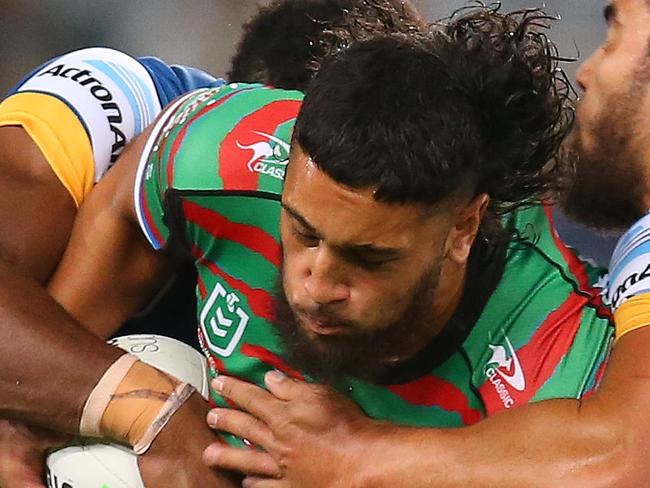 SYDNEY, AUSTRALIA - MAY 29: Keaon Koloamatangi of the Rabbitohs tackled during the round 12 NRL match between the South Sydney Rabbitohs and the Parramatta Eels at Stadium Australia, on May 29, 2021, in Sydney, Australia. (Photo by Jason McCawley/Getty Images)