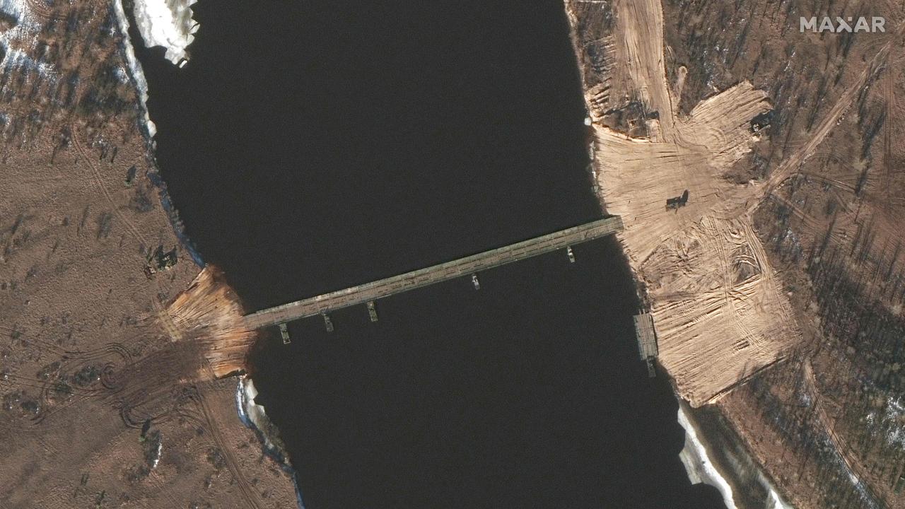 This satellite image released by Maxar Technologies shows a close-up of road construction and new Ponton bridge over the Pripyat river, Belarus, near Chernobyl. Picture: AFT.