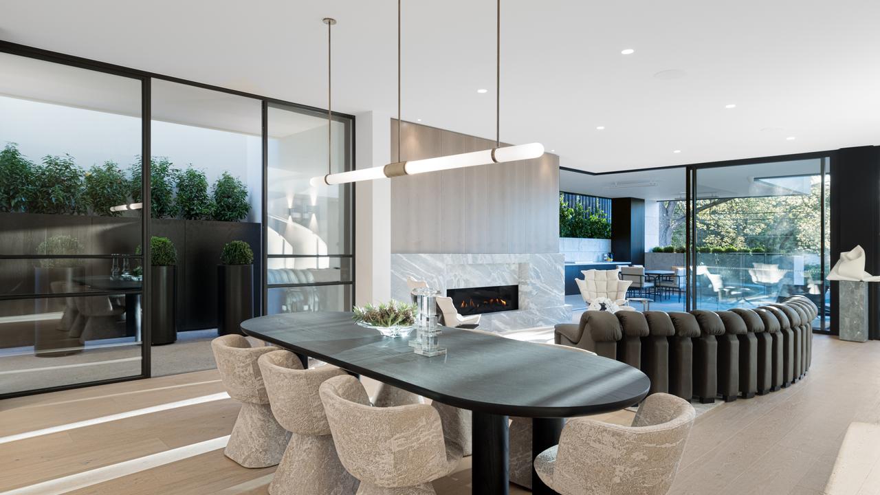 The showpiece kitchen features a monumental marble island bench, Gaggenau appliances and a full butler’s pantry.