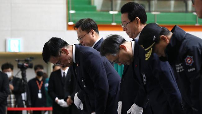 Acting President and Deputy Prime Minister and Minister of Strategy and Finance Choi Sang-mok pays tribute at a group memorial altar for victims of Flight 7C2216. Picture: Chung Sung-Jun/Getty Images