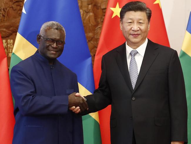 Chinese President Xi Jinping greets Solomon Islands leader Manasseh Sogavare in Beijing in 2019. Picture: Getty Images