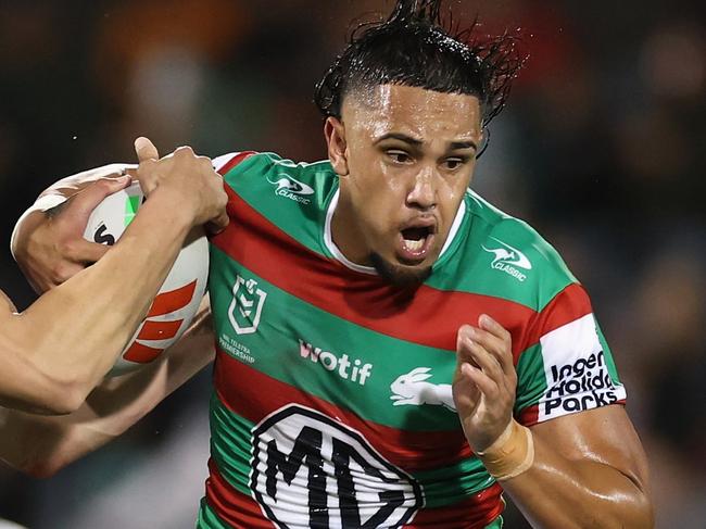 SYDNEY, AUSTRALIA - MAY 18: Keaon Koloamatangi of the Rabbitohs is tackled during the round eleven NRL match between Wests Tigers and Rabbitohs at Campbelltown Sports Stadium, on May 18, 2025, in Sydney, Australia. (Photo by Cameron Spencer/Getty Images)