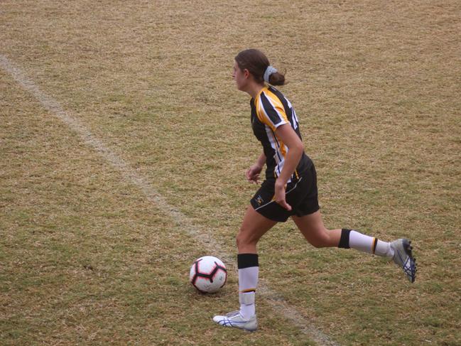 Ryleigh Wotherspoon playing football for Capricornia. Picture: Supplied.