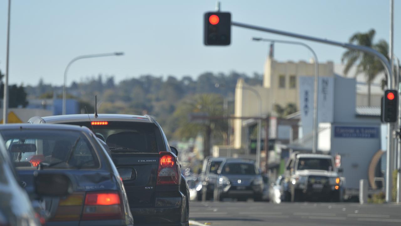 Traffic wait at a red light to cross Herries St travelling north on Neil St in the Toowoomba CBD.