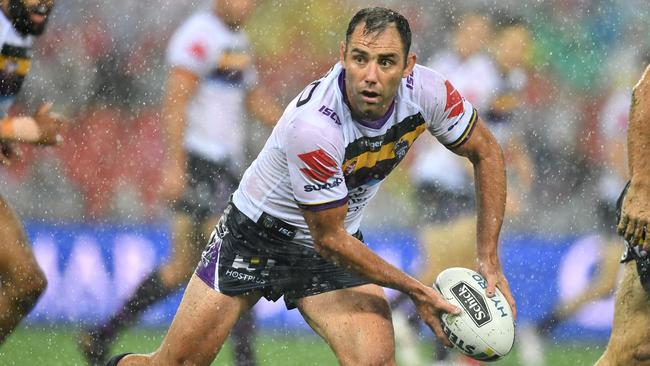 Cameron Smith (centre) of the Storm in action during the NRL Johnathan Thurston and Cameron Smith Testimonial match between the Melbourne Storm and the North Queensland Cowboys played at Suncorp Stadium in Brisbane, Friday, February 23, 2018. (AAP Image/Darren England) NO ARCHIVING, EDITORIAL USE ONLY