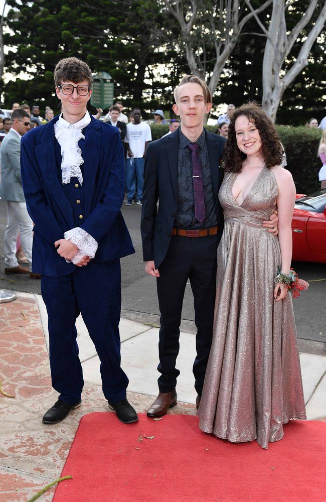 Trae Smith, Lutin Cliff and Karina O'Reilly at Centenary Heights State High School formal. Picture; Patrick Woods.