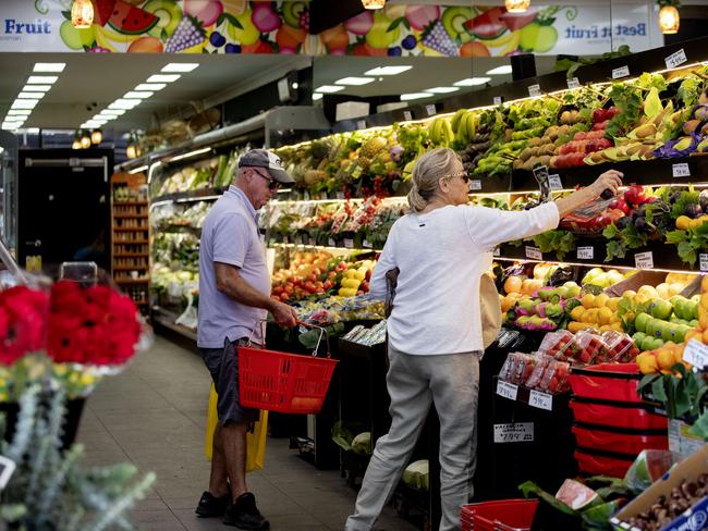 Customers shop for fresh fruit and vegetables in Sydney, Sunday, April 17 2022. Picture: Nikki Short