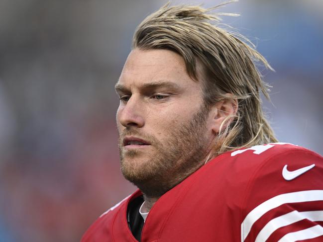 CHARLOTTE, NORTH CAROLINA - OCTOBER 09: Mitch Wishnowsky #18 of the San Francisco 49ers runs off the field at halftime against the Carolina Panthers Bank of America Stadium on October 09, 2022 in Charlotte, North Carolina. (Photo by Eakin Howard/Getty Images)