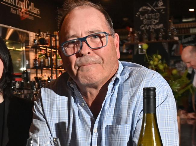 16/5/24. East End Cellars this week announced that customers who buy a bottle in the cellar will have to pay $25 from Monday Ã a $5increase Ã to drink it (like corkage), in their dining space in Vardon Avenue in the Cbd and Norwood sites.Jesse McKinnon (Functions Mgr), Iris Zhang (Store Mgr) with Michael Andrewartha (owner) in the cbd.Picture: Keryn Stevens