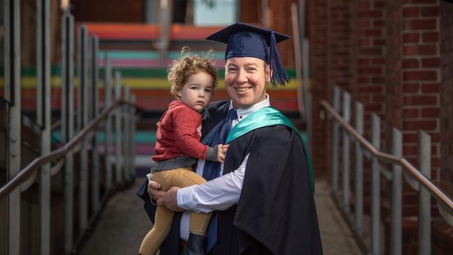 Simon Moore with his daughter Elodie, 2. has graduated from Deakin University with a Bachelor of Nursing Distinction. Picture: Brad Fleet