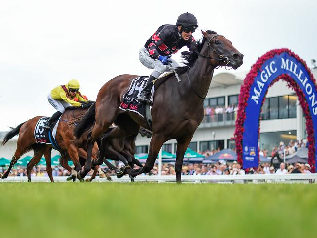 Jockey Luke Currie rides Away Game to victory in race 7, the Magic Millions 2YO Classic, during Magic Millions Race Day at Aquis Park on the Gold Coast, Saturday, January 11, 2020. (AAP Image/Albert Perez)