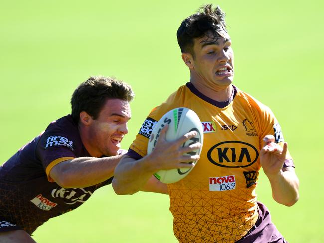 BRISBANE, AUSTRALIA - MAY 18: Herbie Farnworth attempts to break away from the defence of Brodie Croft during a Brisbane Broncos NRL training session at the Clive Berghofer Centre on May 18, 2020 in Brisbane, Australia. (Photo by Bradley Kanaris/Getty Images)