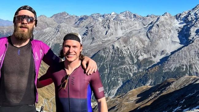 Melbourne premiership pair Max Gawn and Ed Langdon have climbed another peak, cycling the difficult Stelvio Pass in northern Italy.