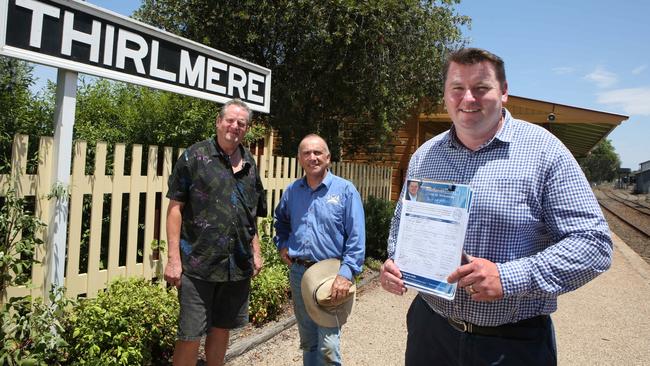 Nat Smith (right) with a petition to gauge community support for the project earlier this year. Picture: Robert Pozo