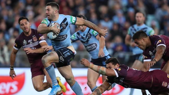 NSW's James Tedesco evading his rivals during the last State of Origin series. Picrett Costello