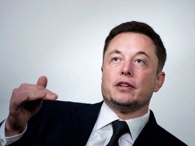 (FILES) In this file photo taken on July 19, 2017 Elon Musk, CEO of SpaceX and Tesla, speaks during the International Space Station Research and Development Conference at the Omni Shoreham Hotel in Washington, DC. Tesla chief Elon Musk told employees May 14, 2018 the electric carmaker is being reorganized to speed up production of Model 3 vehicles -- a key to profitability at the fast-growing firm.