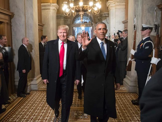 US President-elect Donald Trump and President Barack Obama arrive for Trump's inauguration ceremony at the Capitol in Washington,DC on January 20, 2017. Donald Trump was sworn in as the 45th president of the United States Friday -- ushering in a new political era that has been cheered and feared in equal measure. / AFP PHOTO / POOL / J.Scott APPLEWHITE