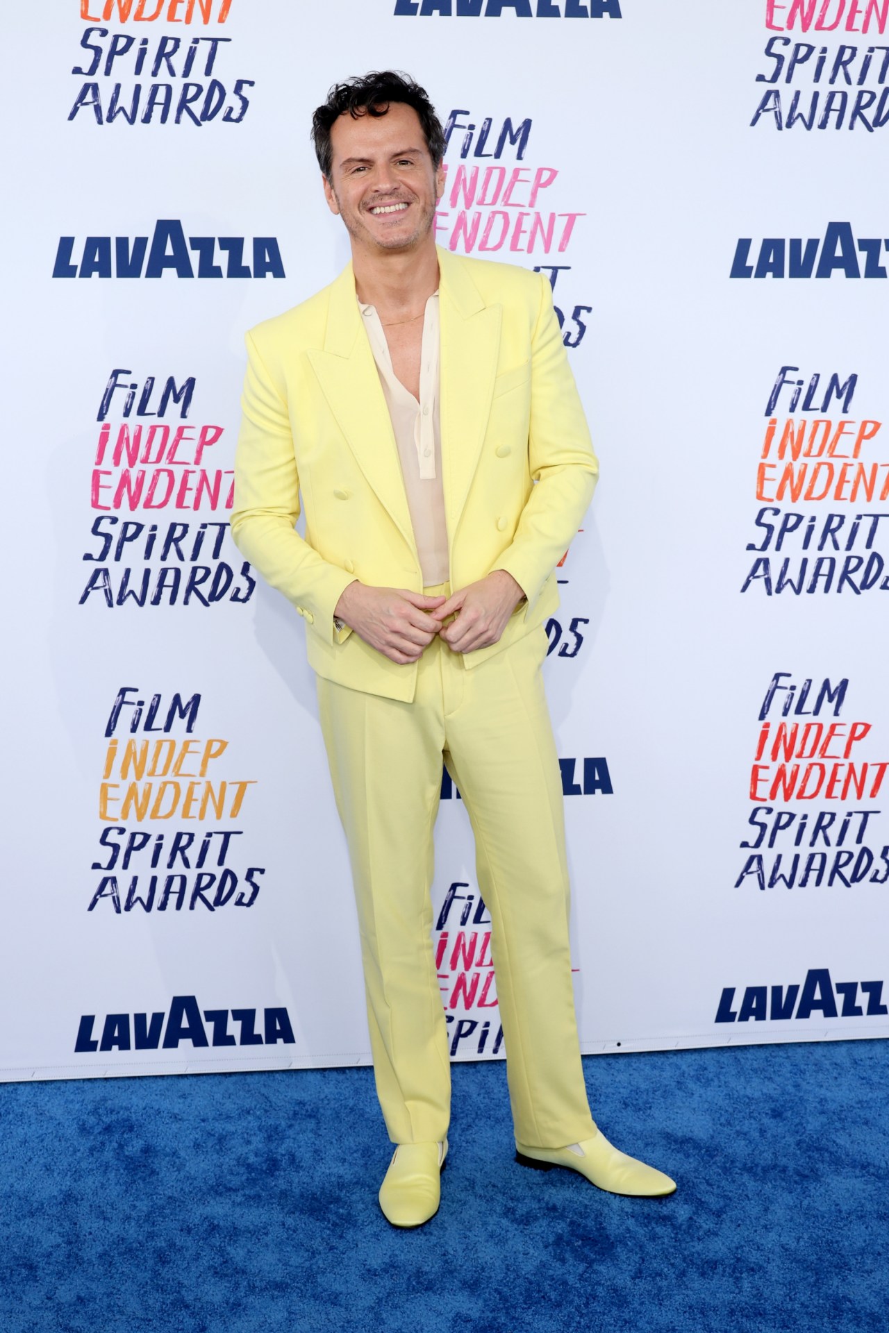 <p>Take this banana-yellow, custom Etro suit for the 2024 Film Independent Spirit Awards. On the wrong person, a fit like this would have you looking one hat short of a guardian for a curious monkey, but on Scott, with the cropped jacket and sheer polo underneath, he&rsquo;s an effulgent beacon of suave sunshine. Try saying that ten times fast.&nbsp;</p><p><br>Of course, Scott&rsquo;s ability to captivate the red carpet has been helped greatly by stylist <a href="https://www.instagram.com/warrenalfiebaker/?hl=en" target="_blank" rel="noopener">Warren Alfie Baker.</a> But then again, it&rsquo;s all about how it looks on the man at the end of the day.&nbsp;</p>