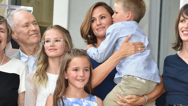 Fin with sister Violet, brother Sam, and famous Mum Jennifer Garner. Picture: Robyn Beck / AFP